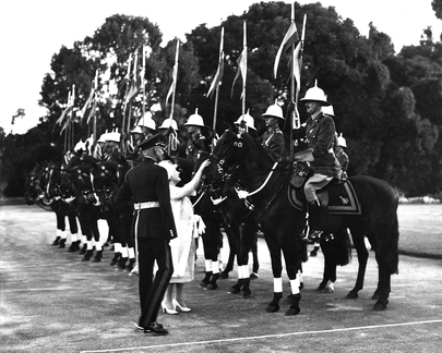 1960 Queen Mum inspects escort