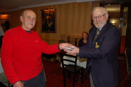 Ed Bonnington handing the spoils to Parry Jones