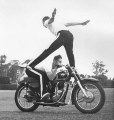 1959 B S A P  Display John Osborne jumping over Terry Franklin
