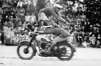 1950 B S A P  Display  4565 Ted Walsh jumping over 4530 Ted Hanley riding at 40 mph