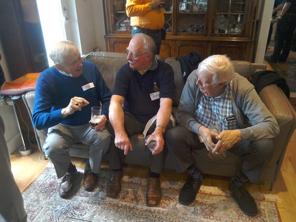 Stan Mills making a point to Robin Harvey and Gordon Norris